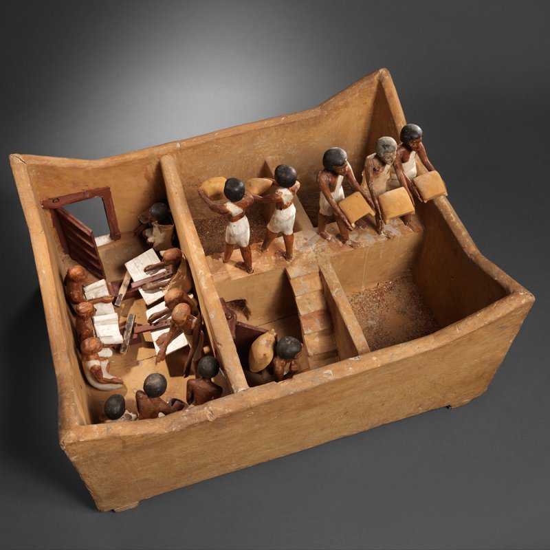 Maqueta funeraria de la tumba de Meketre que representa un granero con escribas que documentan la producción. MET, Nueva York.